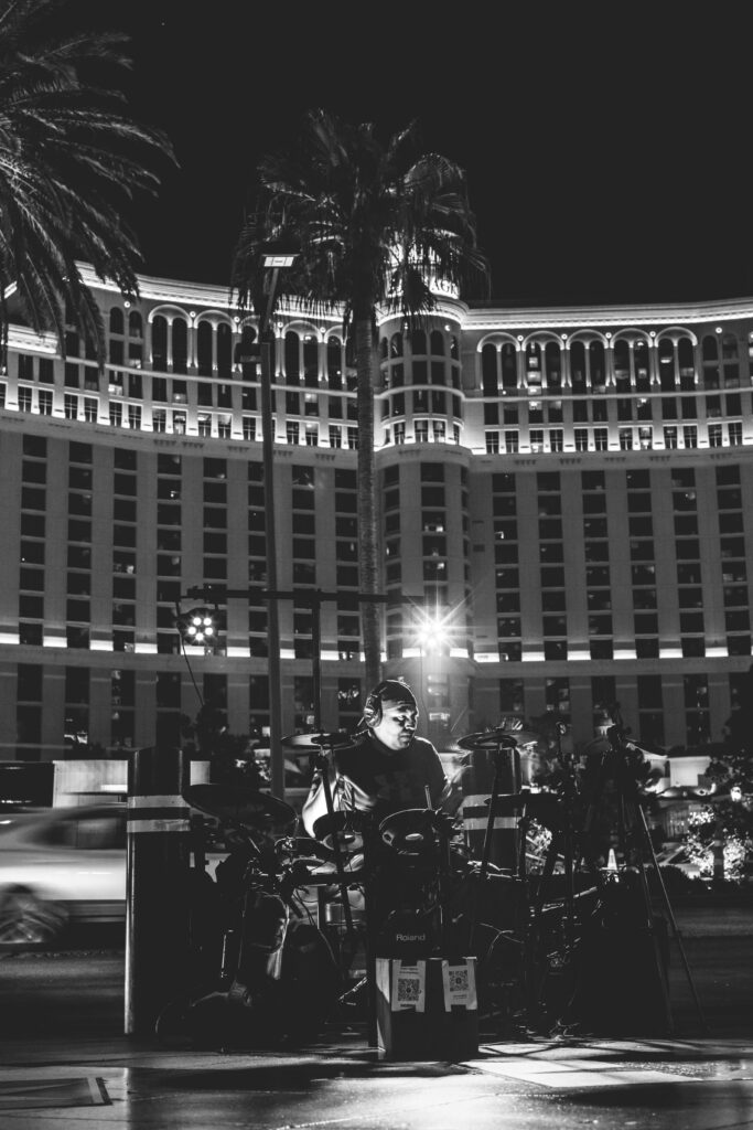 Vegas strip, drummer playing in front of the Bellagio fountain 